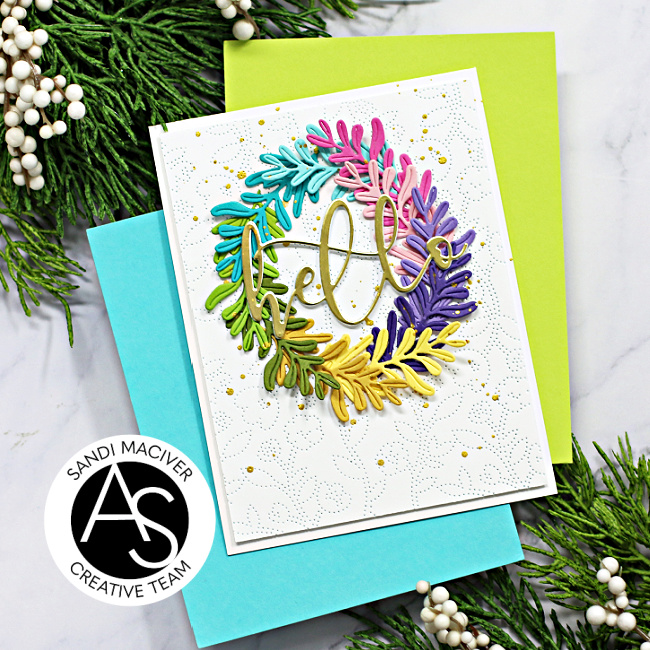 hand made greeting card with a rainbow wreath created with new card making products from Alex Syberia Designs